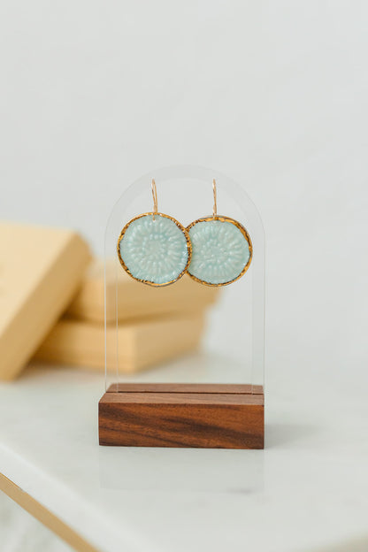Handcrafted turquoise porcelain earrings with hand-applied 22k gold accents by Silver Harvest Studio.