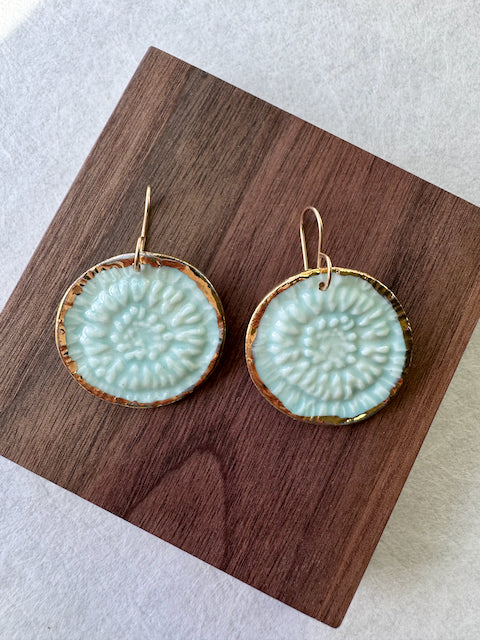 Handcrafted turquoise porcelain earrings with hand-applied 22k gold accents by Silver Harvest Studio.
