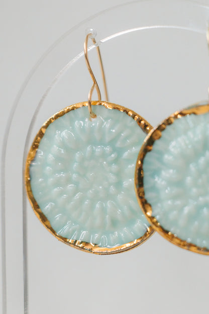 Handcrafted turquoise porcelain earrings with hand-applied 22k gold accents by Silver Harvest Studio.